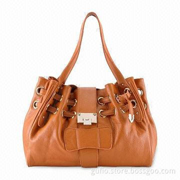 Fashionable Leather Handbag with Drawstring Closure and Gold Toned Hardware